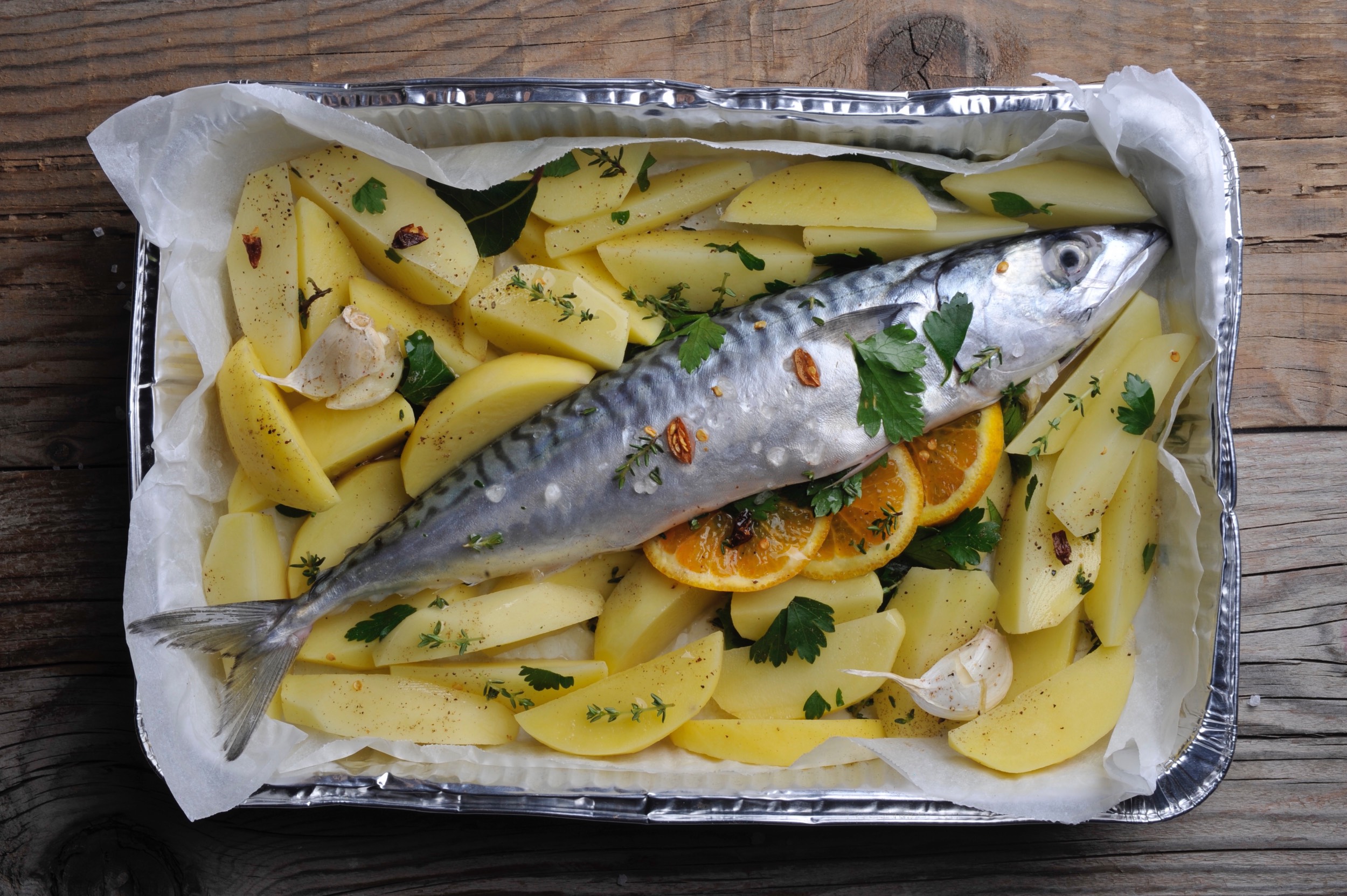 Roasted Mackerel with orange and potatoes Recipe and styling: Orsola Ciriello Kogan Photo: Lucia Zeccara